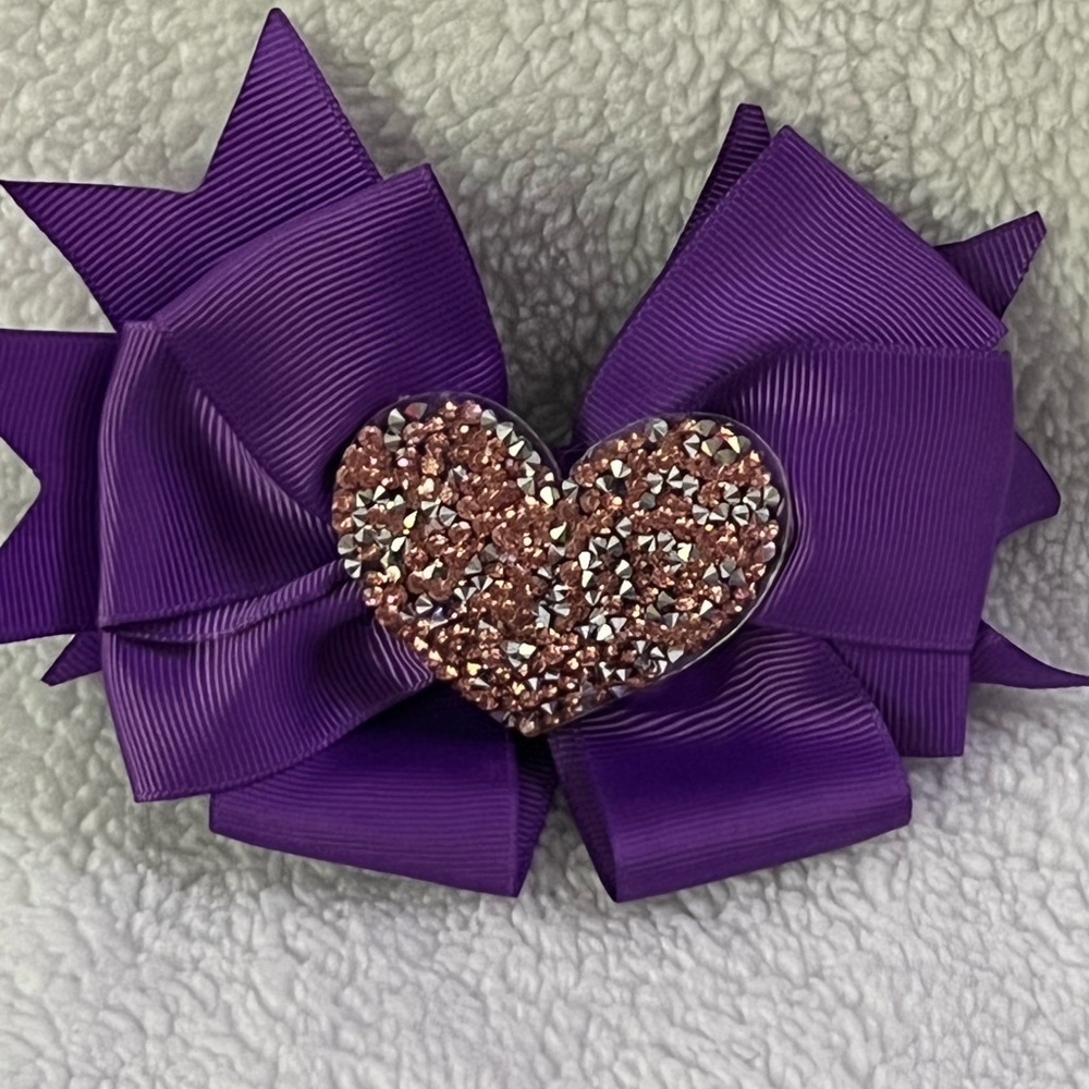 2 for $8 Purple medium sized bow with heart